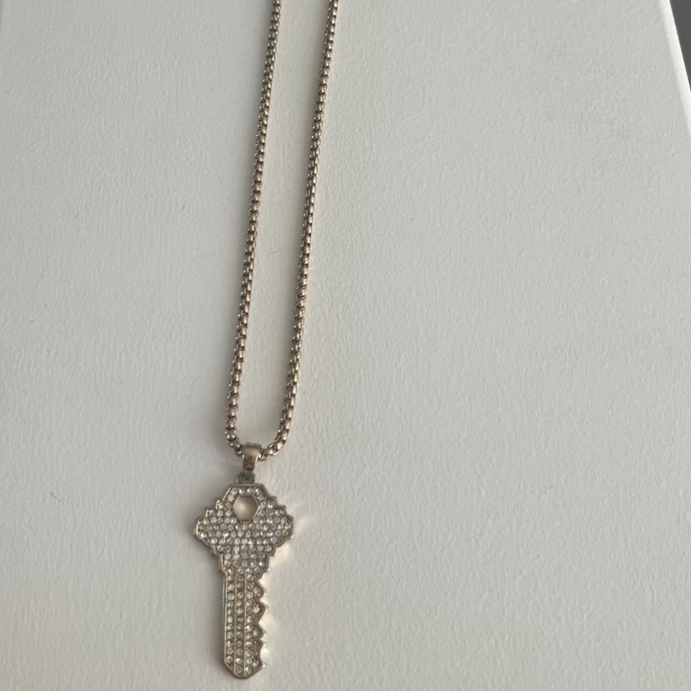 Golden diamond key necklace